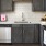 a kitchen with black cabinets