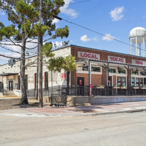 A beautiful community at the heart of all your passions a building with a fence around it