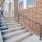 a brick building with a staircase
