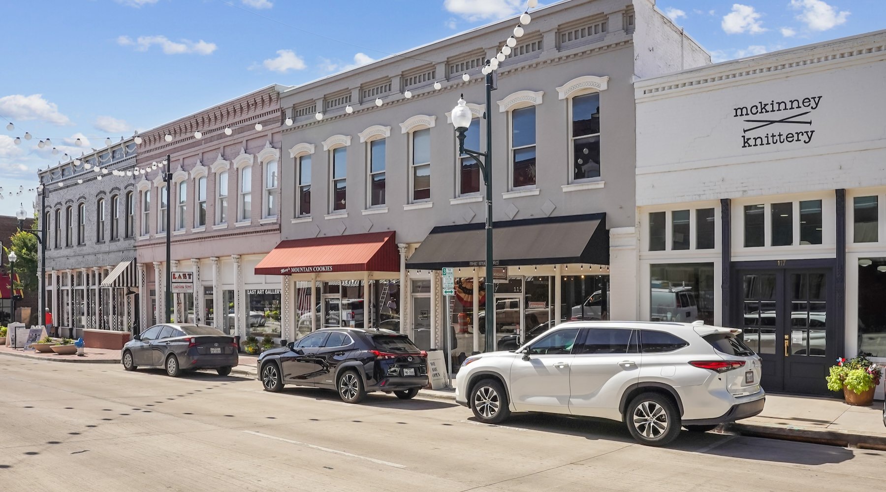 Experience Living in Downtown McKinney exterior of shops